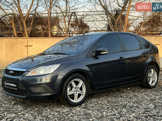 Серый Форд Фокус, объемом двигателя 1.4 л и пробегом 220 тыс. км за 5790 $, фото 3 на Automoto.ua