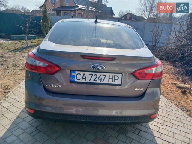 Серый Форд Фокус, объемом двигателя 1.6 л и пробегом 187 тыс. км за 7300 $, фото 2 на Automoto.ua