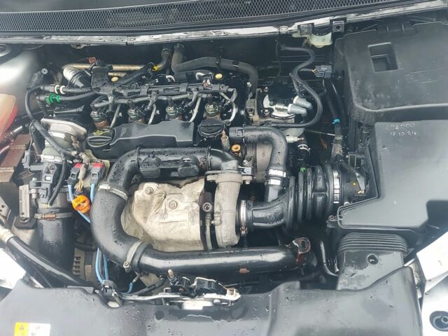 Серый Форд Фокус, объемом двигателя 1.6 л и пробегом 300 тыс. км за 3700 $, фото 1 на Automoto.ua