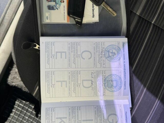 Сірий Форд Фокус, об'ємом двигуна 1.4 л та пробігом 209 тис. км за 4700 $, фото 9 на Automoto.ua