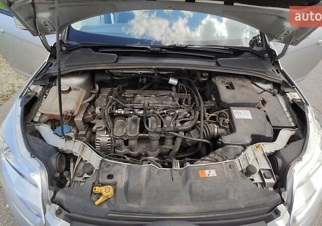 Сірий Форд Фокус, об'ємом двигуна 1.6 л та пробігом 249 тис. км за 6900 $, фото 80 на Automoto.ua