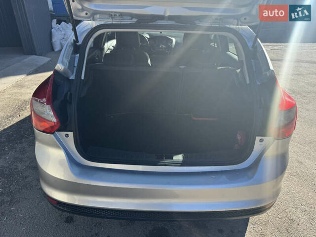 Серый Форд Фокус, объемом двигателя 1.6 л и пробегом 217 тыс. км за 6899 $, фото 6 на Automoto.ua