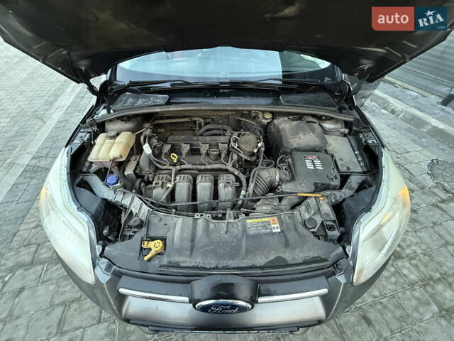 Серый Форд Фокус, объемом двигателя 2 л и пробегом 234 тыс. км за 7400 $, фото 1 на Automoto.ua