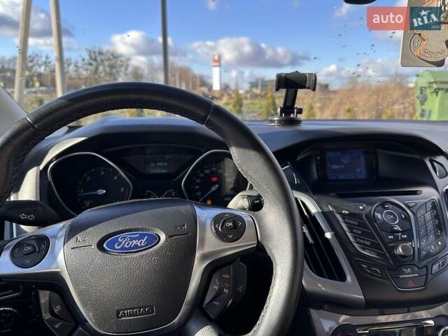 Серый Форд Фокус, объемом двигателя 1.56 л и пробегом 225 тыс. км за 8500 $, фото 13 на Automoto.ua