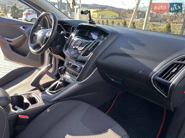 Серый Форд Фокус, объемом двигателя 1.56 л и пробегом 225 тыс. км за 8500 $, фото 9 на Automoto.ua