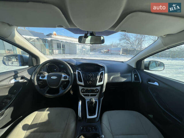 Серый Форд Фокус, объемом двигателя 1.6 л и пробегом 338 тыс. км за 4550 $, фото 6 на Automoto.ua