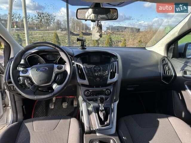 Серый Форд Фокус, объемом двигателя 1.56 л и пробегом 225 тыс. км за 8500 $, фото 7 на Automoto.ua