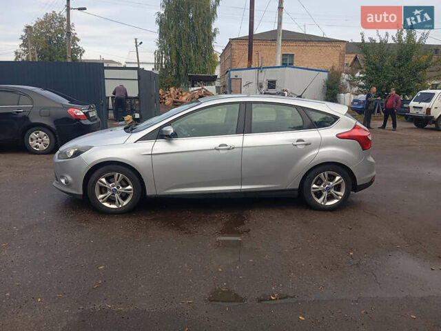 Серый Форд Фокус, объемом двигателя 1.6 л и пробегом 339 тыс. км за 5100 $, фото 6 на Automoto.ua