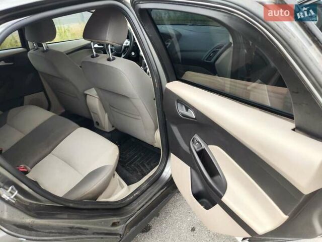 Серый Форд Фокус, объемом двигателя 2 л и пробегом 250 тыс. км за 7000 $, фото 1 на Automoto.ua