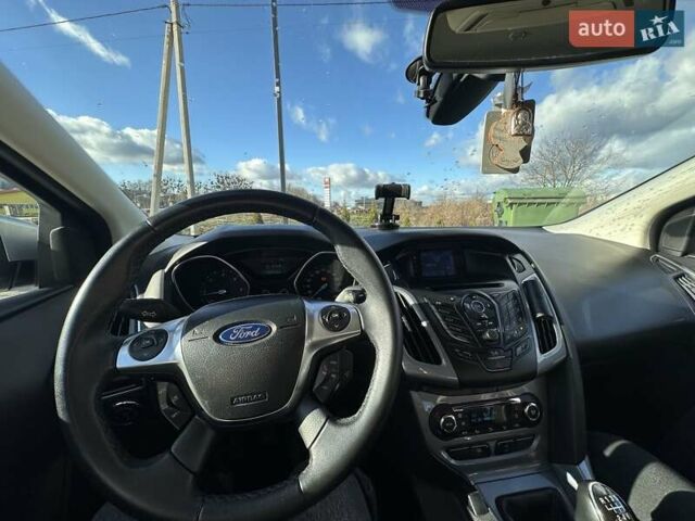 Серый Форд Фокус, объемом двигателя 1.56 л и пробегом 225 тыс. км за 8500 $, фото 12 на Automoto.ua