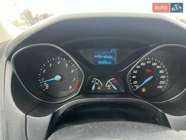 Серый Форд Фокус, объемом двигателя 1 л и пробегом 164 тыс. км за 7000 $, фото 11 на Automoto.ua