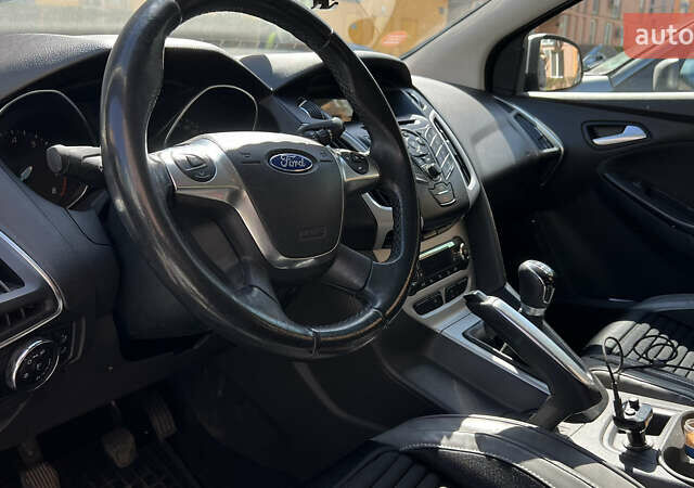 Форд Фокус 2013 у Києві на Automoto.ua Сірий Форд Фокус, об'ємом двигуна 1 л та пробігом 169 тис. км за 6700 $, фото 17 на Automoto.ua