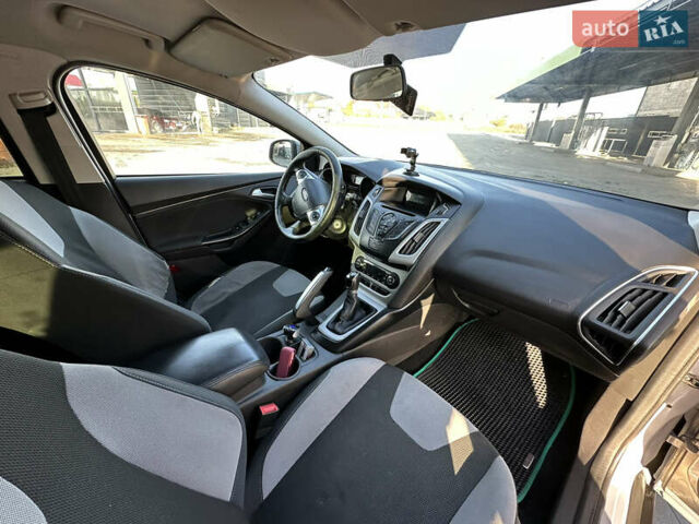 Сірий Форд Фокус, об'ємом двигуна 1 л та пробігом 186 тис. км за 5800 $, фото 6 на Automoto.ua