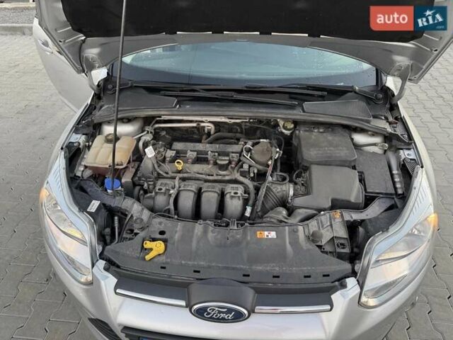 Форд Фокус 2013 в Львове на Automoto.ua Серый Форд Фокус, объемом двигателя 2 л и пробегом 128 тыс. км за 7400 $, фото 18 на Automoto.ua