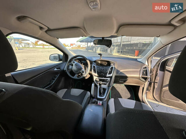 Сірий Форд Фокус, об'ємом двигуна 1 л та пробігом 186 тис. км за 5800 $, фото 7 на Automoto.ua