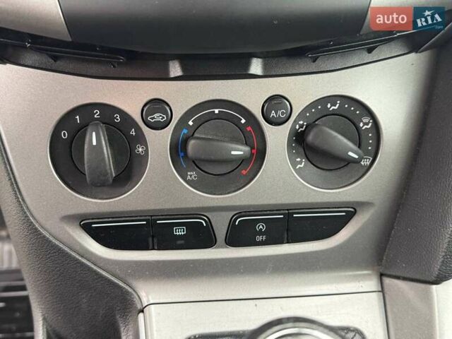 Сірий Форд Фокус, об'ємом двигуна 1 л та пробігом 156 тис. км за 7990 $, фото 20 на Automoto.ua