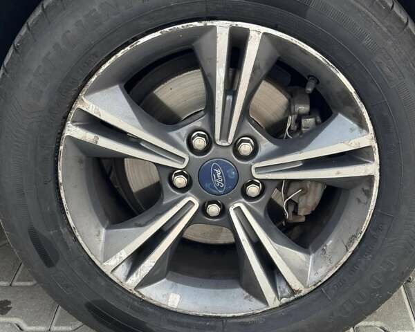 Форд Фокус 2013 в Львове на Automoto.ua Серый Форд Фокус, объемом двигателя 2 л и пробегом 128 тыс. км за 7400 $, фото 14 на Automoto.ua