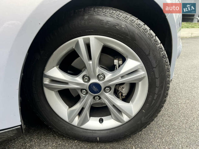 Сірий Форд Фокус, об'ємом двигуна 1 л та пробігом 129 тис. км за 6499 $, фото 9 на Automoto.ua