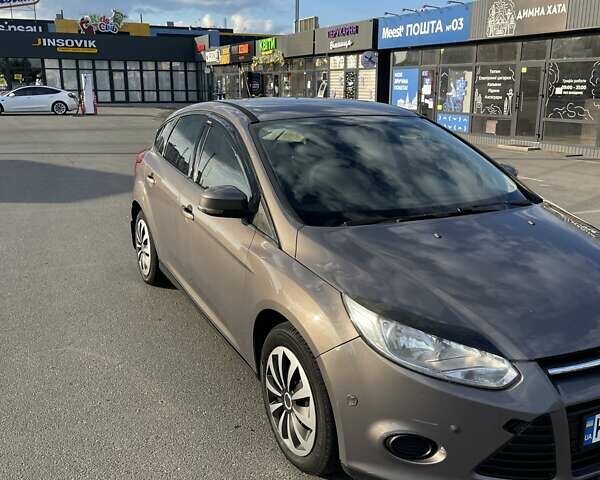 Серый Форд Фокус, объемом двигателя 1 л и пробегом 207 тыс. км за 6300 $, фото 7 на Automoto.ua