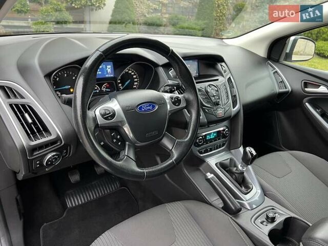 Форд Фокус 2014 в Стрые на Automoto.ua Серый Форд Фокус, объемом двигателя 1.6 л и пробегом 197 тыс. км за 9350 $, фото 75 на Automoto.ua