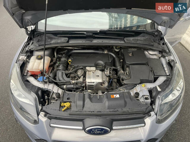 Сірий Форд Фокус, об'ємом двигуна 1 л та пробігом 129 тис. км за 6499 $, фото 24 на Automoto.ua