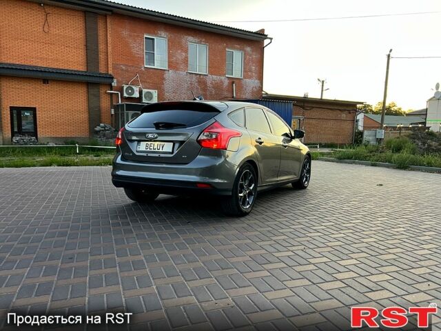 Сірий Форд Фокус, об'ємом двигуна 2 л та пробігом 218 тис. км за 6999 $, фото 4 на Automoto.ua