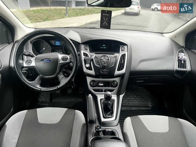 Сірий Форд Фокус, об'ємом двигуна 1 л та пробігом 129 тис. км за 6499 $, фото 11 на Automoto.ua