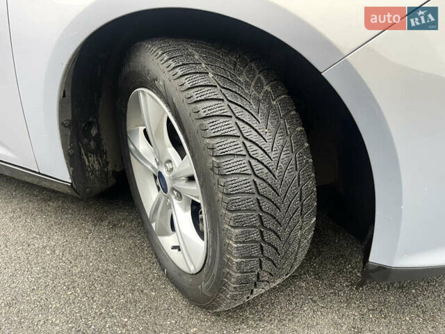 Сірий Форд Фокус, об'ємом двигуна 1 л та пробігом 129 тис. км за 6499 $, фото 10 на Automoto.ua