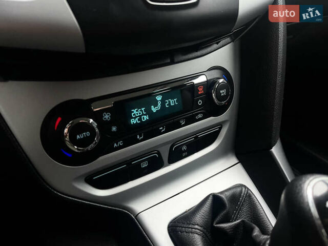 Сірий Форд Фокус, об'ємом двигуна 1 л та пробігом 129 тис. км за 6499 $, фото 17 на Automoto.ua