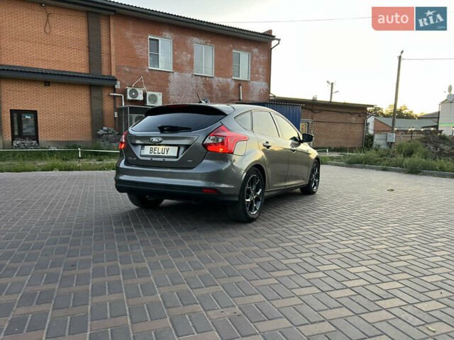 Форд Фокус 2014 в Валках на Automoto.ua Серый Форд Фокус, объемом двигателя 2 л и пробегом 218 тыс. км за 6999 $, фото 2 на Automoto.ua