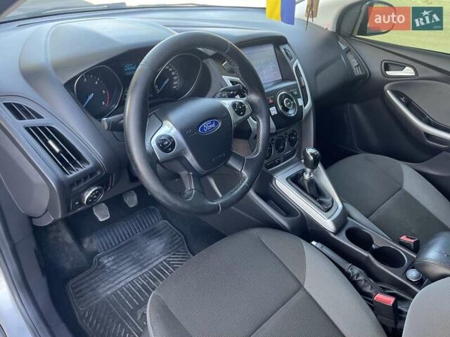 Серый Форд Фокус, объемом двигателя 1.56 л и пробегом 155 тыс. км за 8100 $, фото 6 на Automoto.ua