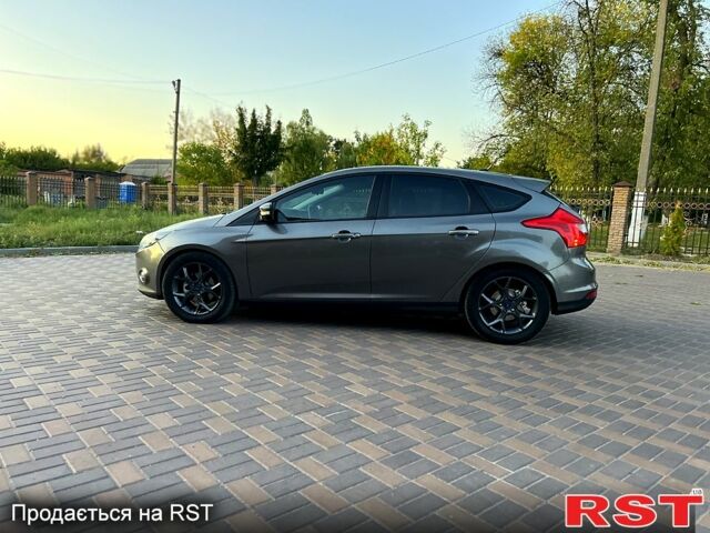 Сірий Форд Фокус, об'ємом двигуна 2 л та пробігом 218 тис. км за 6999 $, фото 2 на Automoto.ua