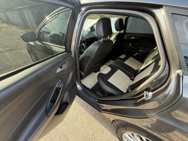 Сірий Форд Фокус, об'ємом двигуна 1 л та пробігом 80 тис. км за 8999 $, фото 13 на Automoto.ua