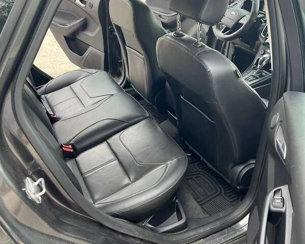 Сірий Форд Фокус, об'ємом двигуна 2 л та пробігом 150 тис. км за 8799 $, фото 6 на Automoto.ua