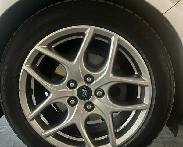 Сірий Форд Фокус, об'ємом двигуна 2 л та пробігом 141 тис. км за 9000 $, фото 29 на Automoto.ua