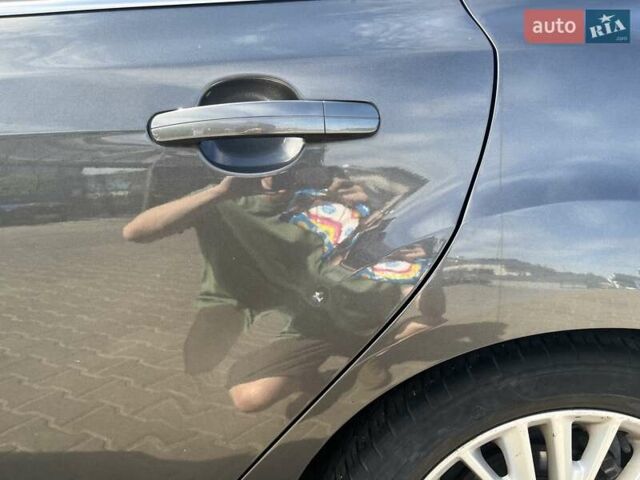 Сірий Форд Фокус, об'ємом двигуна 2 л та пробігом 117 тис. км за 12000 $, фото 31 на Automoto.ua
