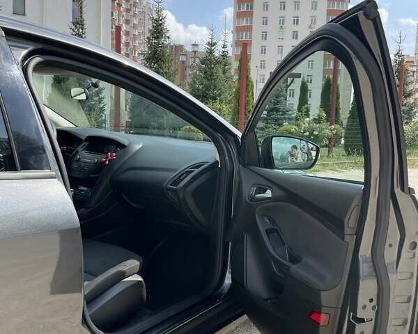 Сірий Форд Фокус, об'ємом двигуна 1 л та пробігом 95 тис. км за 9600 $, фото 16 на Automoto.ua