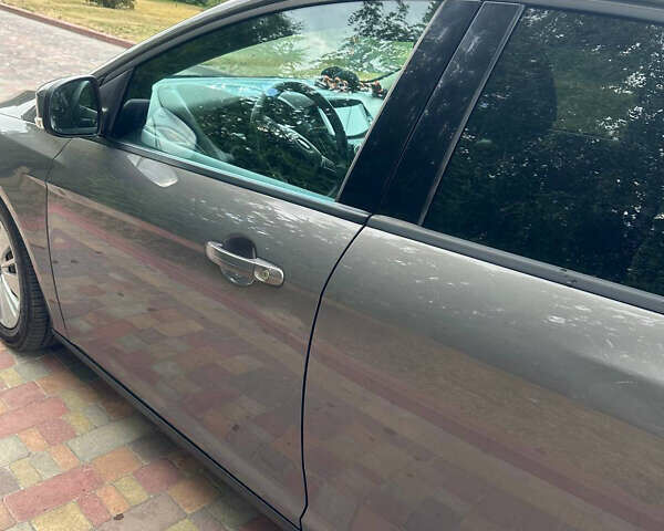 Серый Форд Фокус, объемом двигателя 1 л и пробегом 75 тыс. км за 10500 $, фото 5 на Automoto.ua