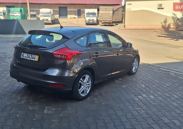 Серый Форд Фокус, объемом двигателя 1.5 л и пробегом 235 тыс. км за 9850 $, фото 7 на Automoto.ua