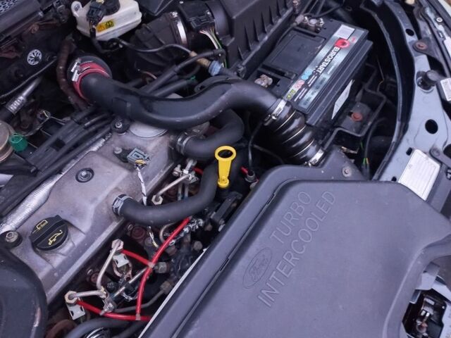 Серый Форд Фокус, объемом двигателя 1.8 л и пробегом 214 тыс. км за 2300 $, фото 15 на Automoto.ua