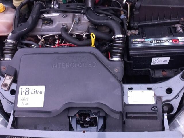 Серый Форд Фокус, объемом двигателя 1.8 л и пробегом 214 тыс. км за 2300 $, фото 12 на Automoto.ua