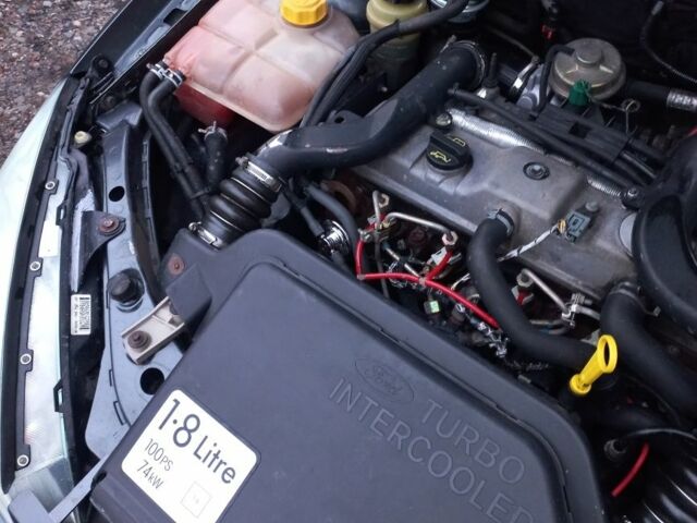 Серый Форд Фокус, объемом двигателя 1.8 л и пробегом 214 тыс. км за 2300 $, фото 14 на Automoto.ua