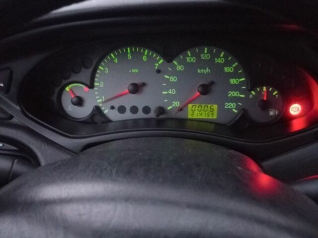 Серый Форд Фокус, объемом двигателя 1.8 л и пробегом 214 тыс. км за 2300 $, фото 8 на Automoto.ua