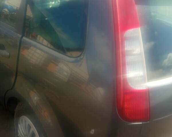 Серый Форд Фокус, объемом двигателя 1.6 л и пробегом 265 тыс. км за 700 $, фото 8 на Automoto.ua