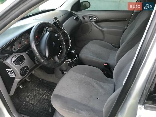 Серый Форд Фокус, объемом двигателя 1.99 л и пробегом 295 тыс. км за 2000 $, фото 4 на Automoto.ua