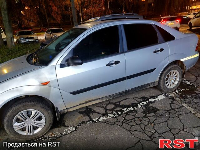 Серый Форд Фокус, объемом двигателя 1.8 л и пробегом 320 тыс. км за 2800 $, фото 2 на Automoto.ua