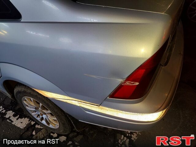 Серый Форд Фокус, объемом двигателя 1.8 л и пробегом 320 тыс. км за 2800 $, фото 1 на Automoto.ua