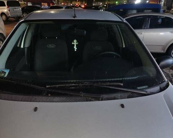 Серый Форд Фокус, объемом двигателя 1.8 л и пробегом 240 тыс. км за 2800 $, фото 5 на Automoto.ua