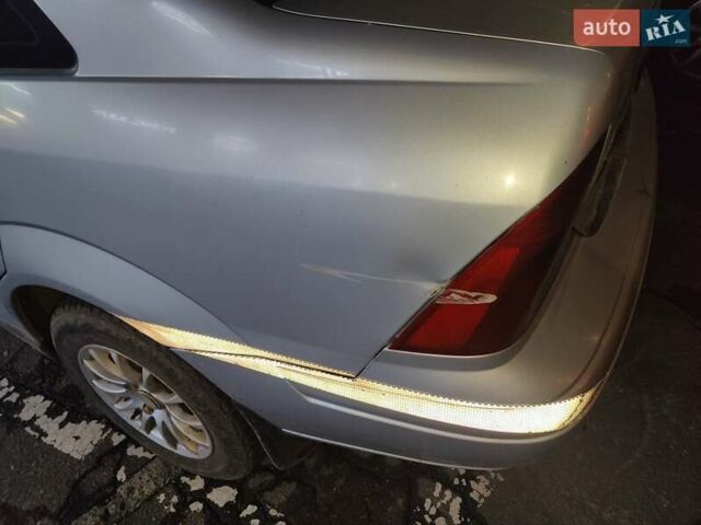 Серый Форд Фокус, объемом двигателя 1.8 л и пробегом 240 тыс. км за 2800 $, фото 4 на Automoto.ua
