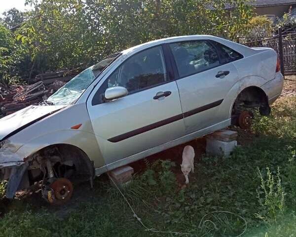 Серый Форд Фокус, объемом двигателя 1.8 л и пробегом 290 тыс. км за 1000 $, фото 6 на Automoto.ua